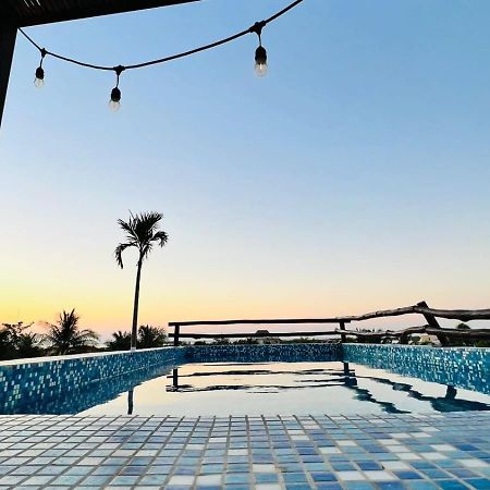 Hotel Mayari Holbox ภายนอก รูปภาพ Rooftop pool at the hotel