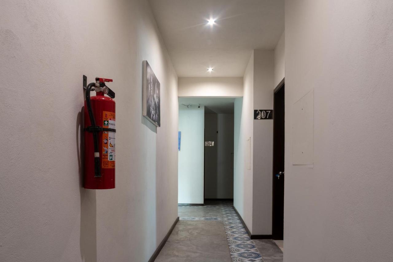 Hotel Mayari Holbox ภายนอก รูปภาพ A fire extinguisher in a hotel