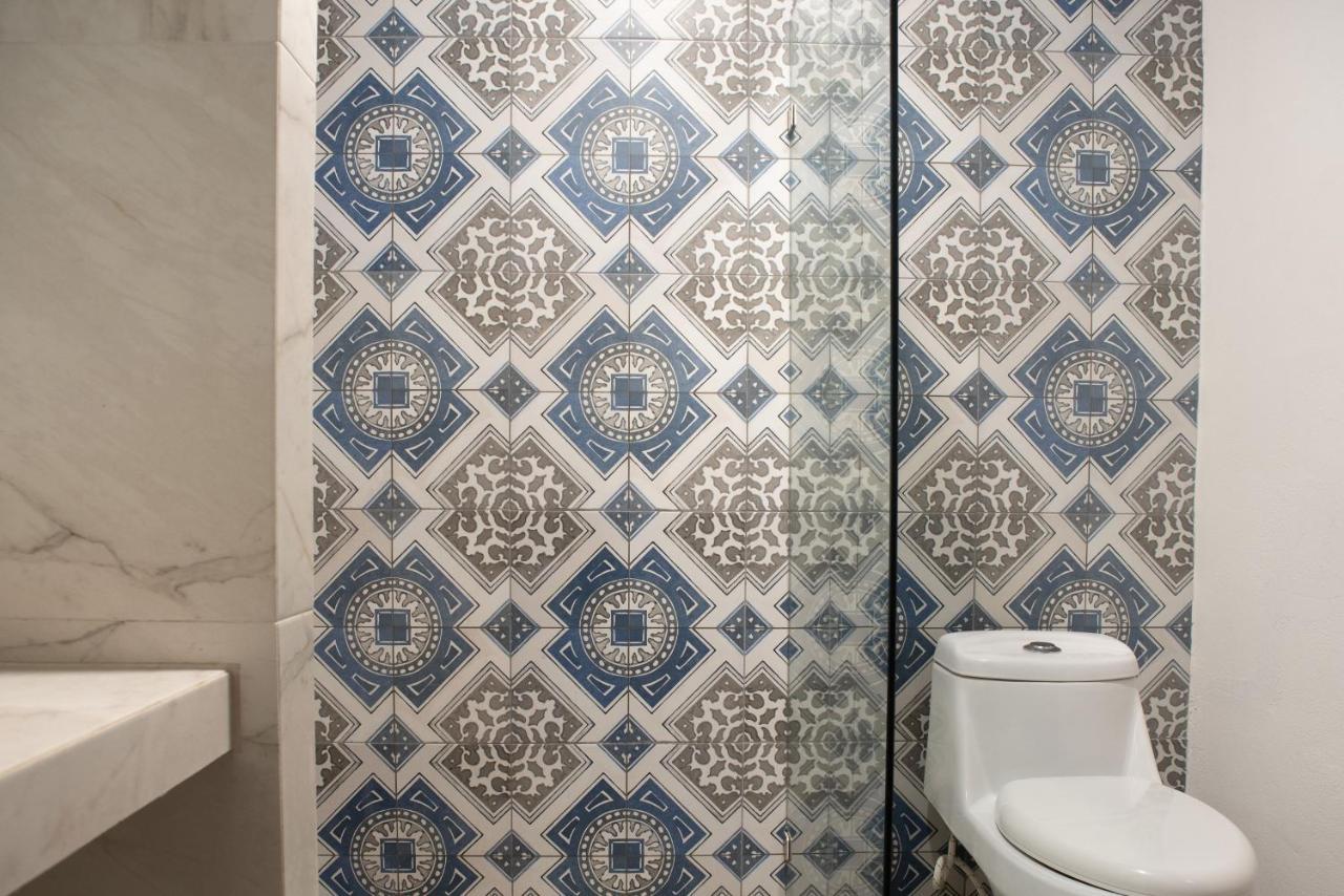 Hotel Mayari Holbox ภายนอก รูปภาพ Bathroom tiles
