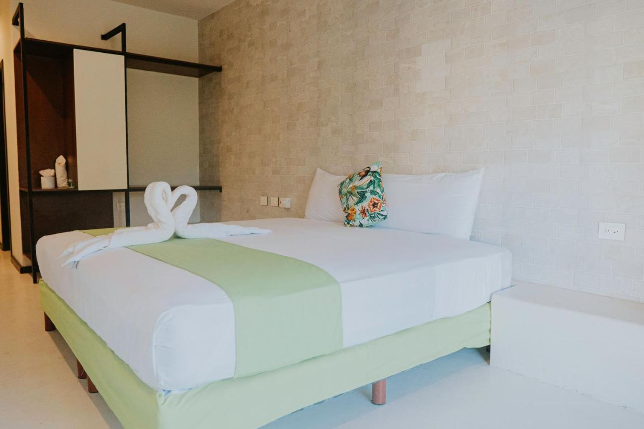 Hotel Mayari Holbox ภายนอก รูปภาพ A bedroom at the hotel