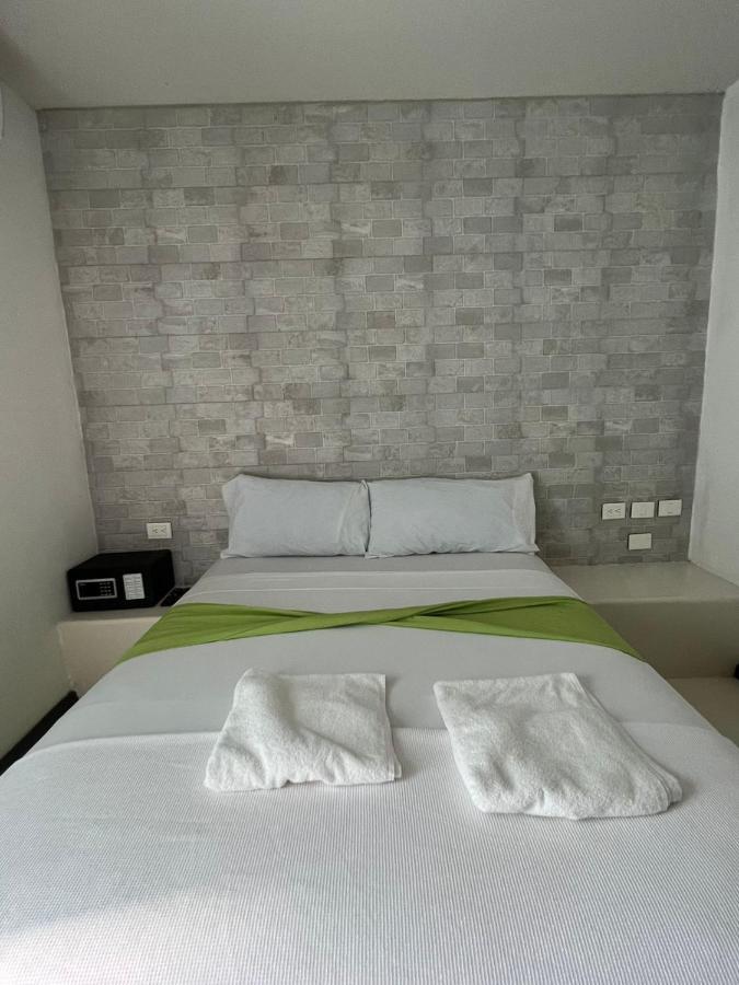 Hotel Mayari Holbox ภายนอก รูปภาพ A bedroom at the hotel